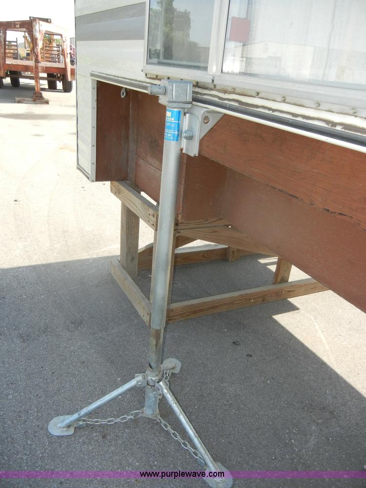 image for item D4362 1983 Keystone four wheel pop-up truck camper
