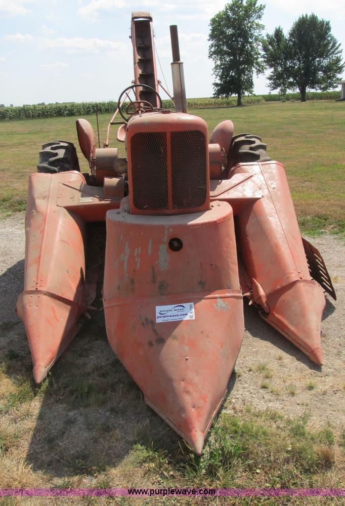 image for item B2765 1950 Allis-Chalmers WD tractor with mounted corn picker