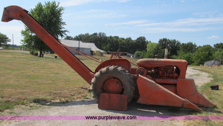 image for item B2765 1950 Allis-Chalmers WD tractor with mounted corn picker
