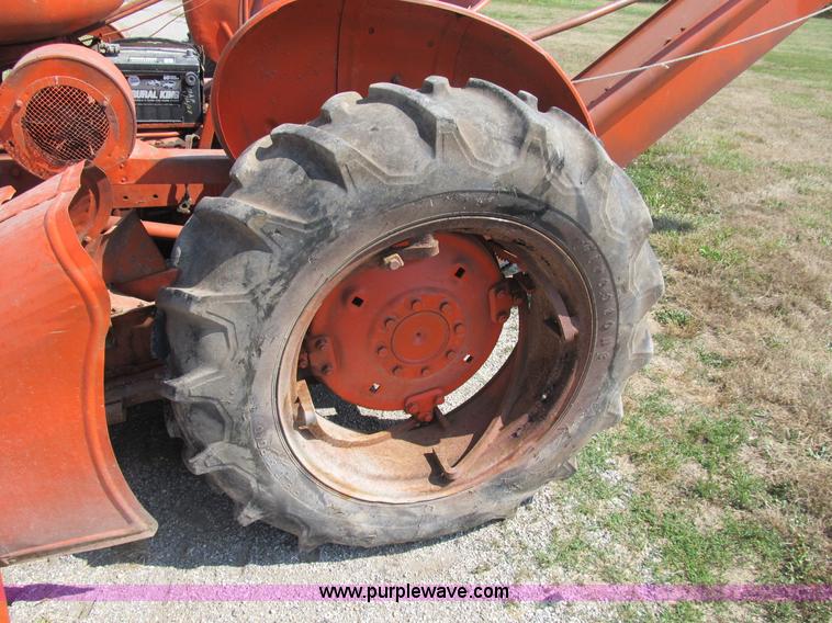 image for item B2765 1950 Allis-Chalmers WD tractor with mounted corn picker