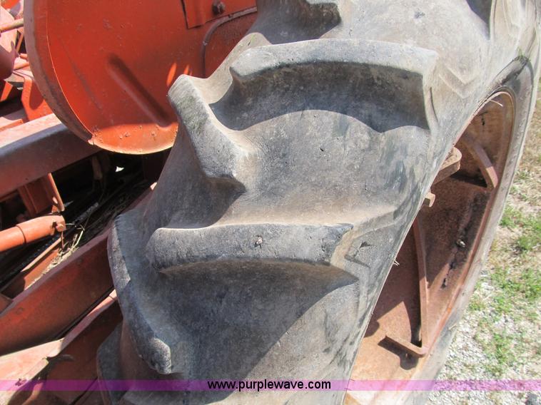 image for item B2765 1950 Allis-Chalmers WD tractor with mounted corn picker