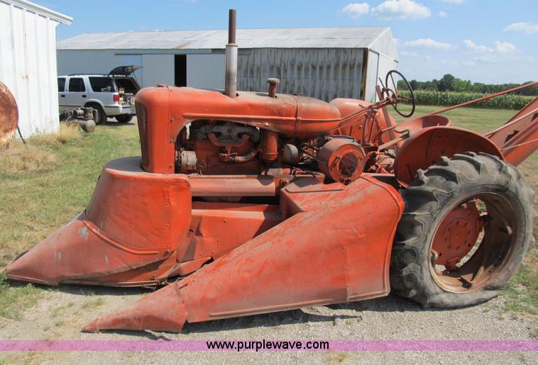 image for item B2765 1950 Allis-Chalmers WD tractor with mounted corn picker