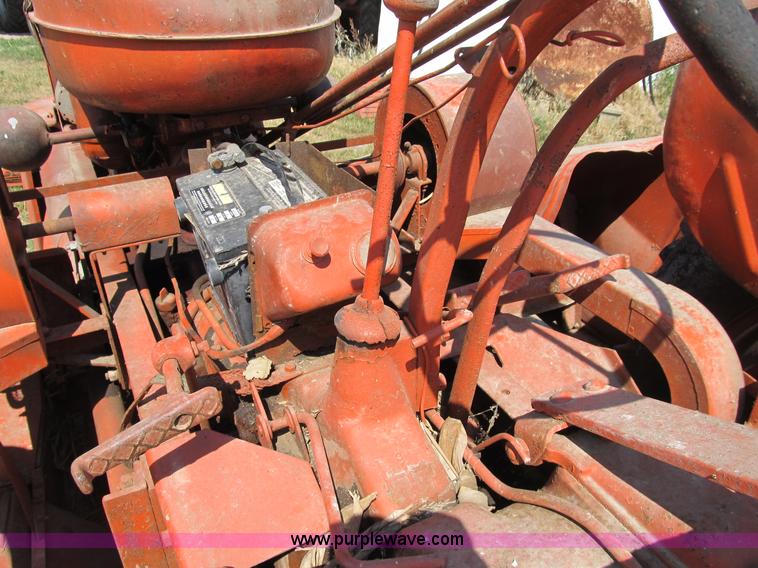 image for item B2765 1950 Allis-Chalmers WD tractor with mounted corn picker