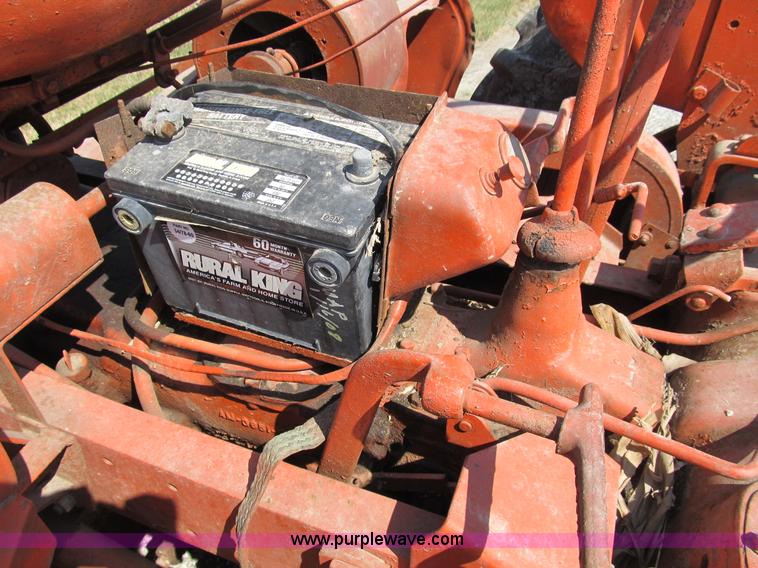 image for item B2765 1950 Allis-Chalmers WD tractor with mounted corn picker