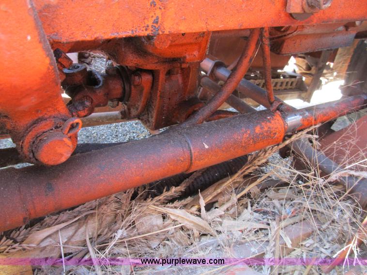 image for item B2765 1950 Allis-Chalmers WD tractor with mounted corn picker