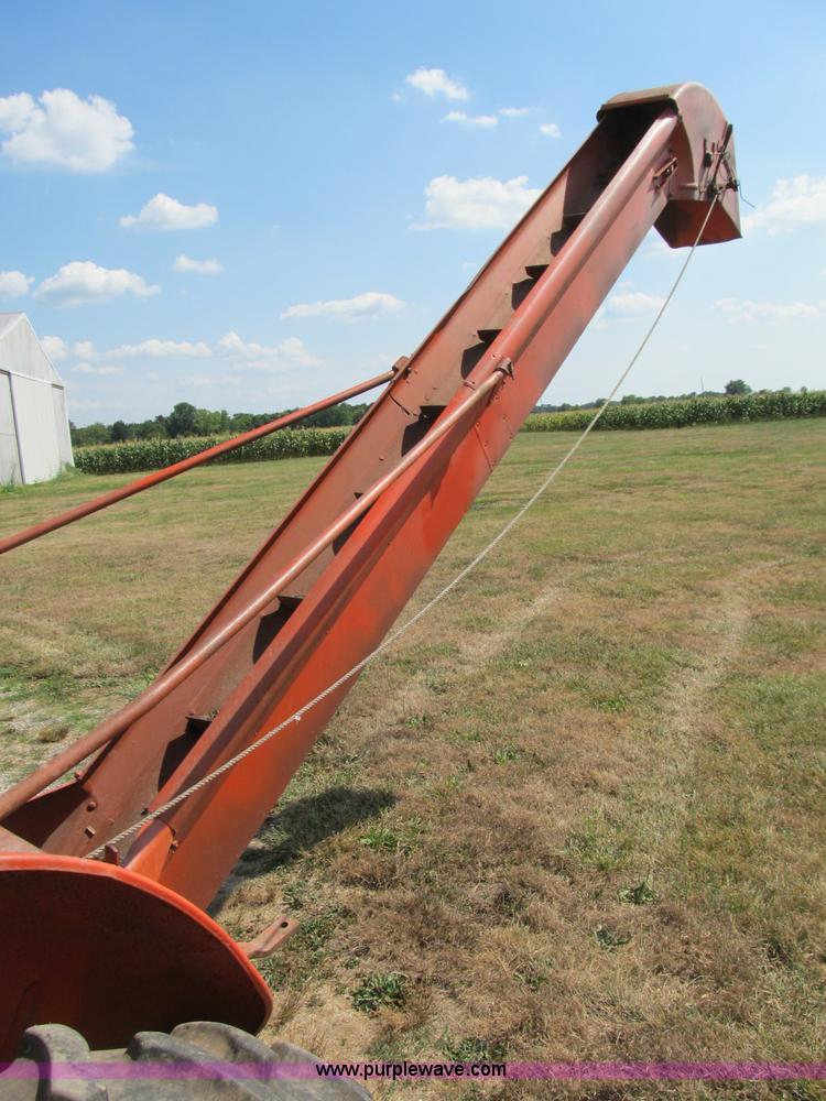 image for item B2765 1950 Allis-Chalmers WD tractor with mounted corn picker