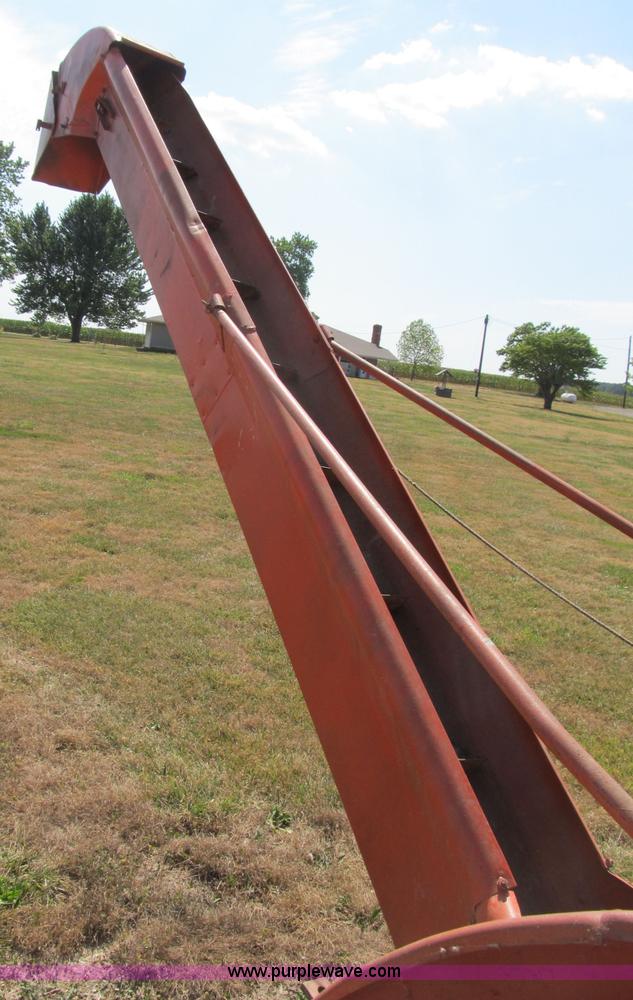 image for item B2765 1950 Allis-Chalmers WD tractor with mounted corn picker