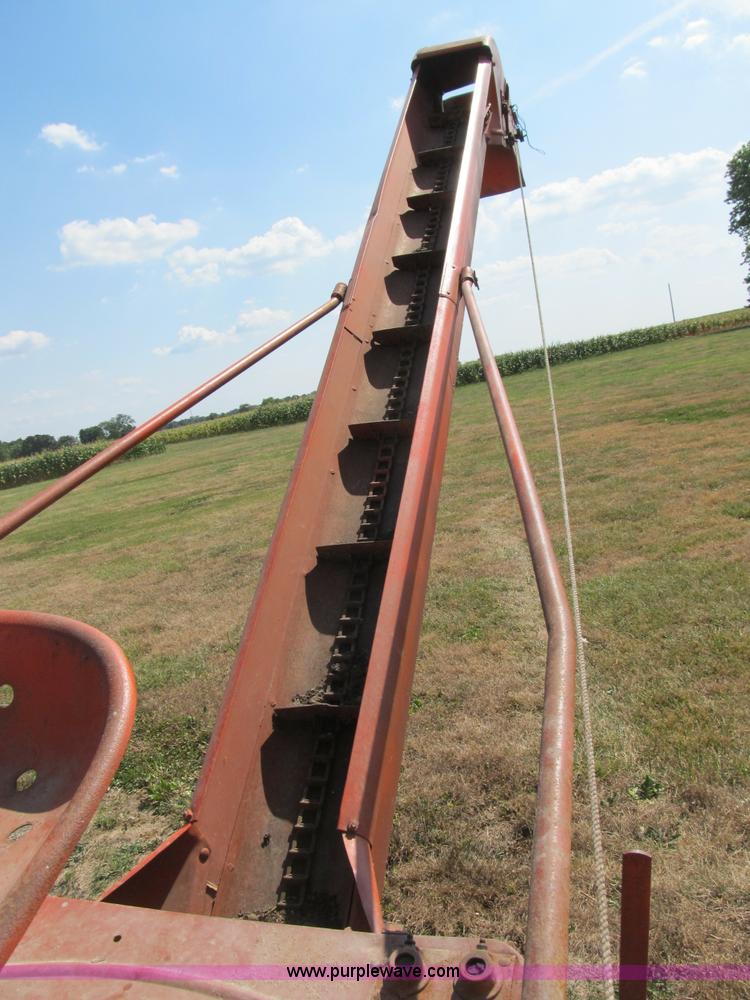 image for item B2765 1950 Allis-Chalmers WD tractor with mounted corn picker