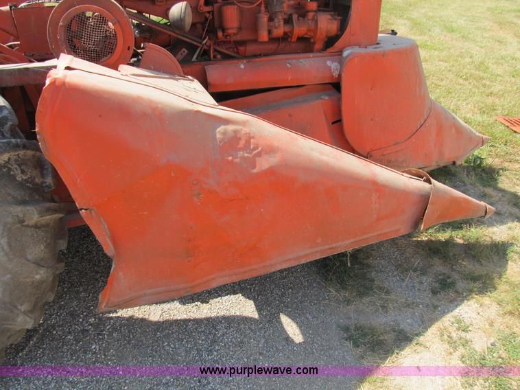 image for item B2765 1950 Allis-Chalmers WD tractor with mounted corn picker