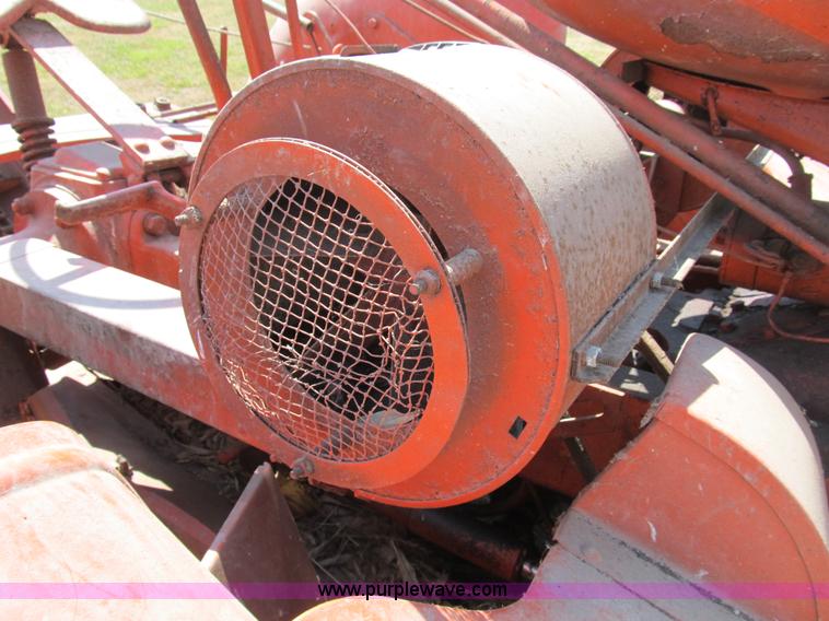 image for item B2765 1950 Allis-Chalmers WD tractor with mounted corn picker