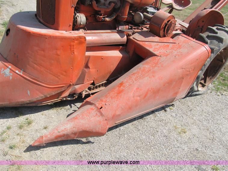 image for item B2765 1950 Allis-Chalmers WD tractor with mounted corn picker