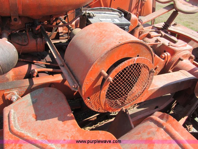 image for item B2765 1950 Allis-Chalmers WD tractor with mounted corn picker