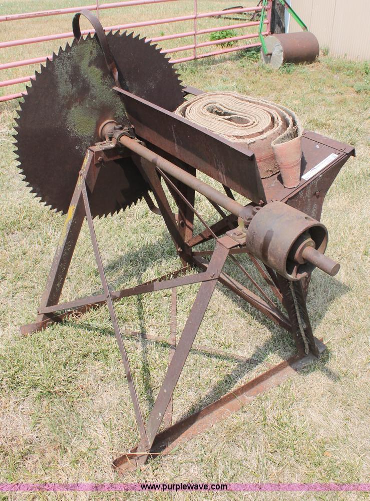image for item L9929 Antique buzz saw with belt