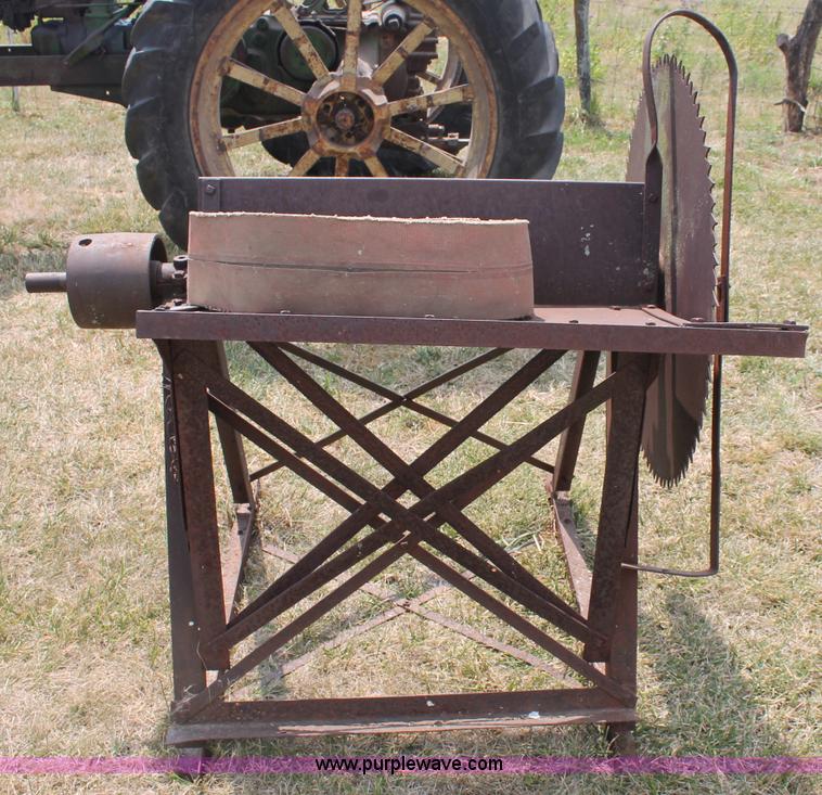 image for item L9929 Antique buzz saw with belt