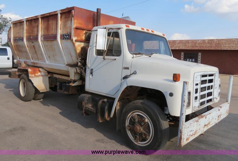 image for item B2431 1982 International S1954 feed mixer truck