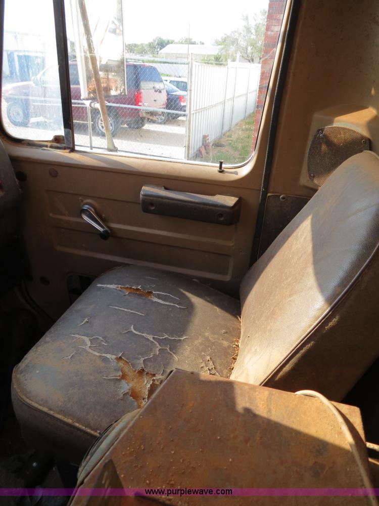 image for item B2431 1982 International S1954 feed mixer truck