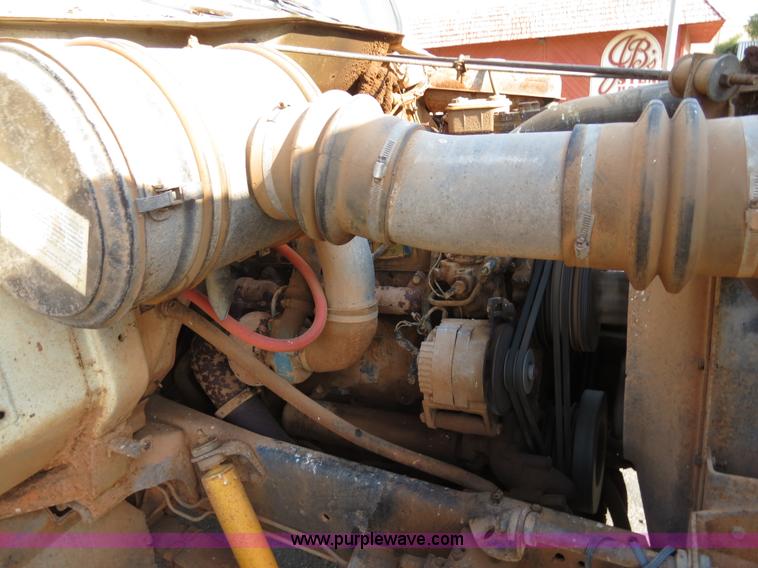 image for item B2431 1982 International S1954 feed mixer truck