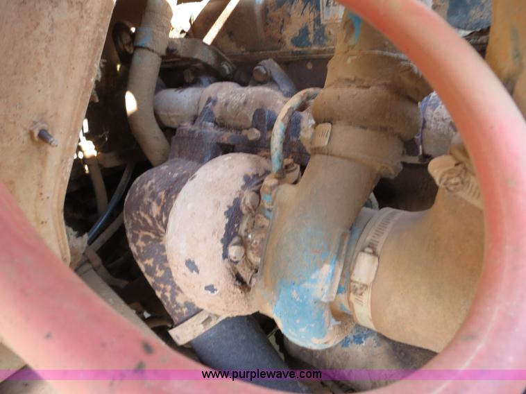 image for item B2431 1982 International S1954 feed mixer truck