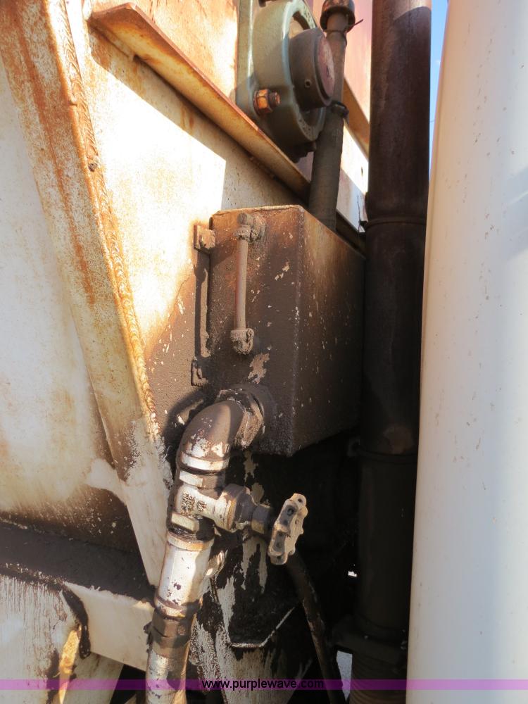 image for item B2431 1982 International S1954 feed mixer truck