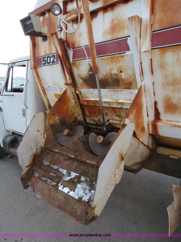 image for item B2431 1982 International S1954 feed mixer truck