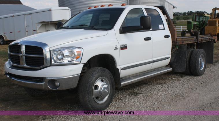 image for item B6867 2007 Dodge Ram 3500 HD quad cab flatbed pickup truck