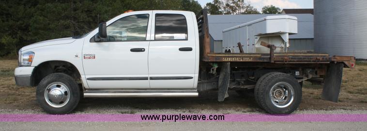 image for item B6867 2007 Dodge Ram 3500 HD quad cab flatbed pickup truck