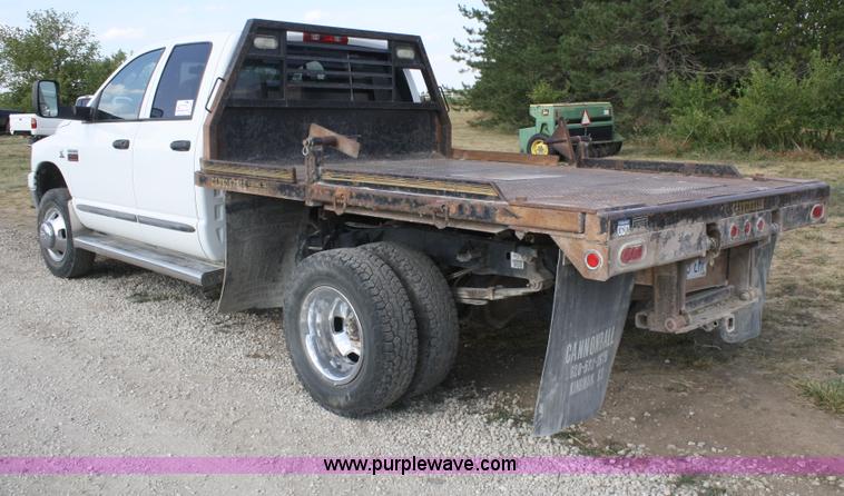 image for item B6867 2007 Dodge Ram 3500 HD quad cab flatbed pickup truck