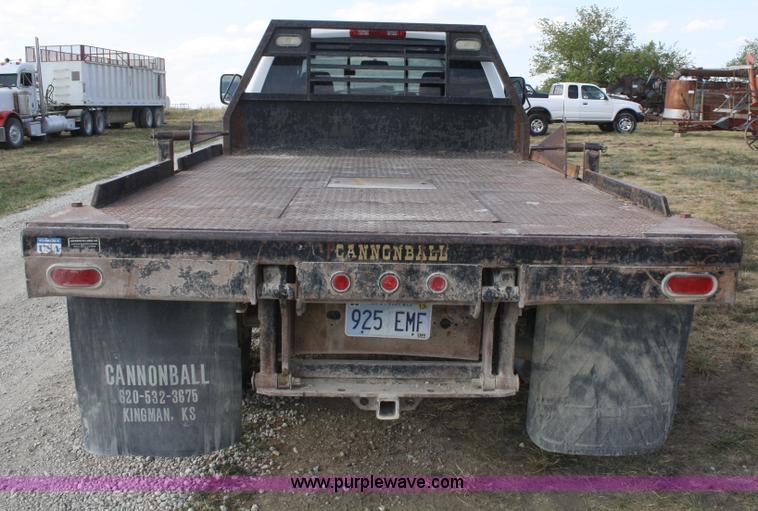 image for item B6867 2007 Dodge Ram 3500 HD quad cab flatbed pickup truck