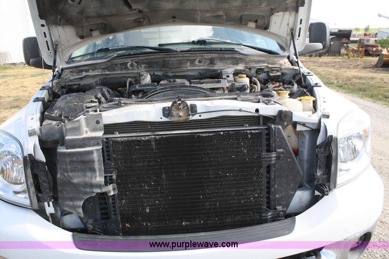 image for item B6867 2007 Dodge Ram 3500 HD quad cab flatbed pickup truck