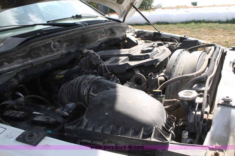 image for item B6867 2007 Dodge Ram 3500 HD quad cab flatbed pickup truck