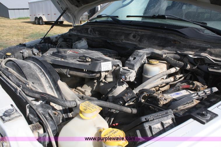 image for item B6867 2007 Dodge Ram 3500 HD quad cab flatbed pickup truck