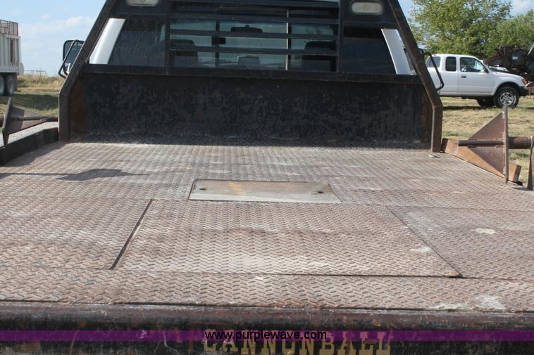 image for item B6867 2007 Dodge Ram 3500 HD quad cab flatbed pickup truck