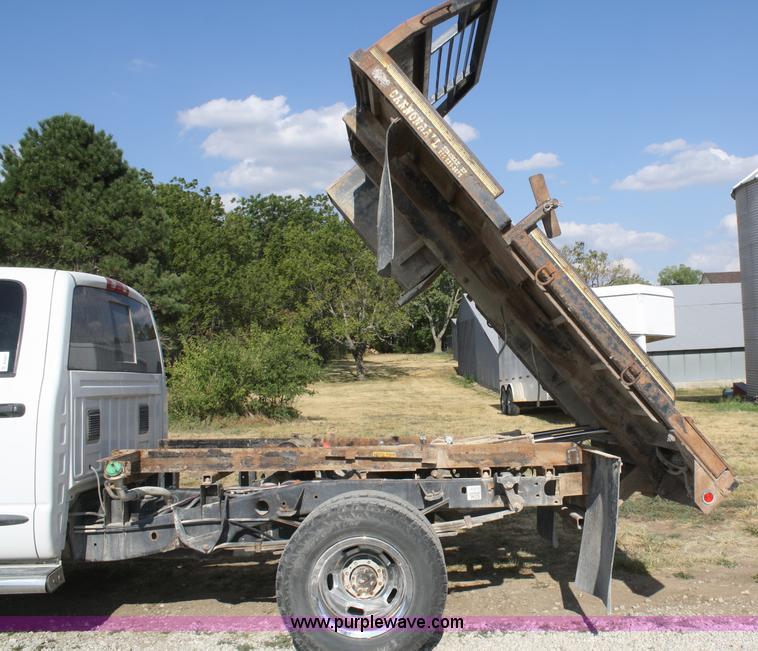 image for item B6867 2007 Dodge Ram 3500 HD quad cab flatbed pickup truck