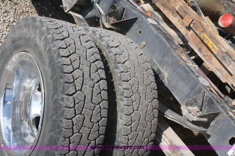 image for item B6867 2007 Dodge Ram 3500 HD quad cab flatbed pickup truck
