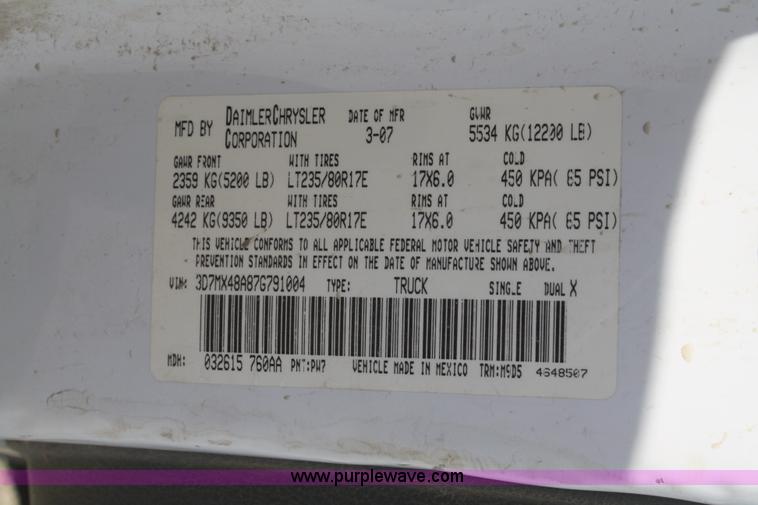 image for item B6867 2007 Dodge Ram 3500 HD quad cab flatbed pickup truck