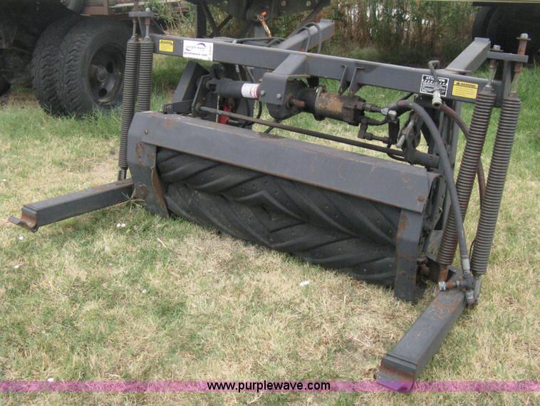 image for item B8041 New Holland self propelled swather crimper attachment