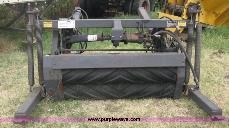 image for item B8041 New Holland self propelled swather crimper attachment