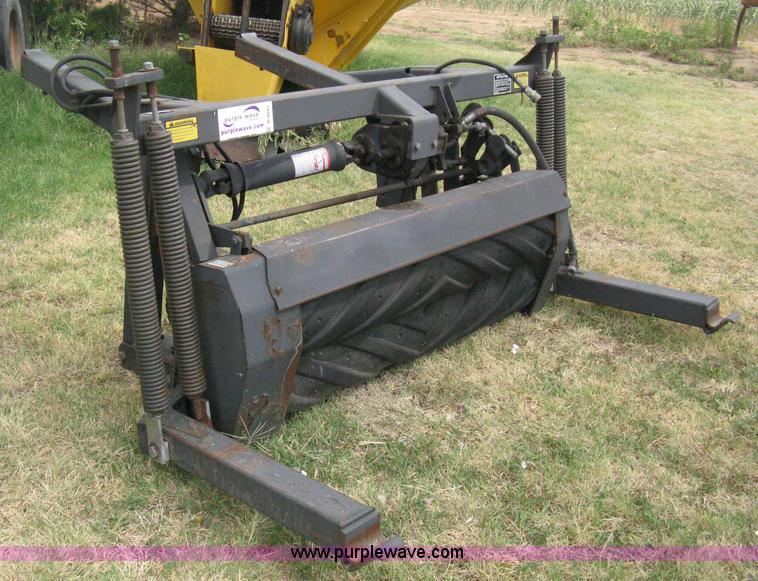 image for item B8041 New Holland self propelled swather crimper attachment