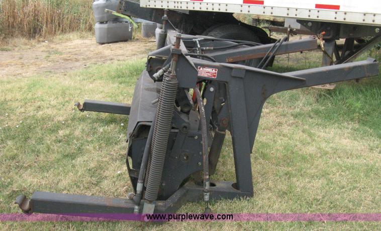 image for item B8041 New Holland self propelled swather crimper attachment