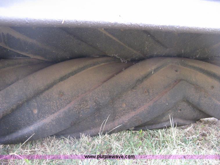 image for item B8041 New Holland self propelled swather crimper attachment