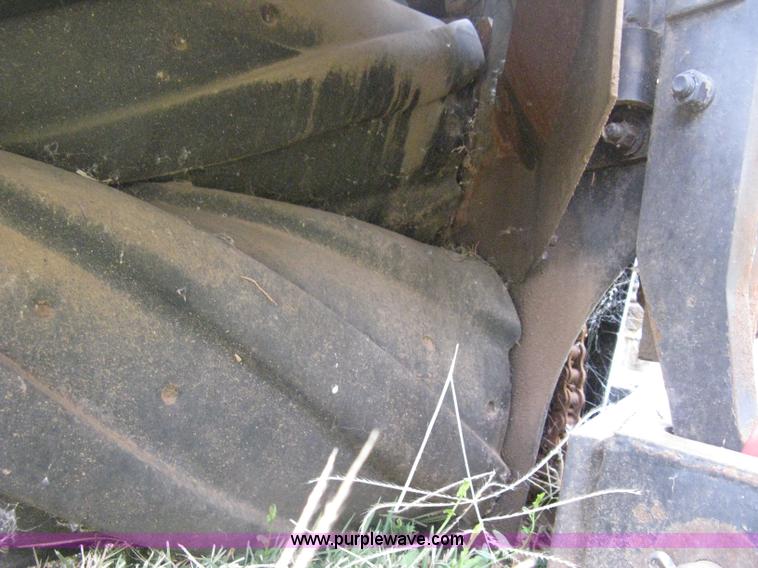 image for item B8041 New Holland self propelled swather crimper attachment