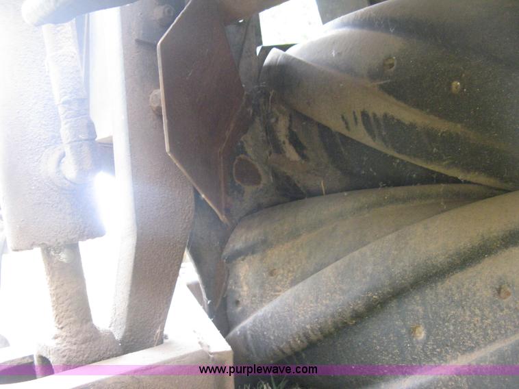 image for item B8041 New Holland self propelled swather crimper attachment