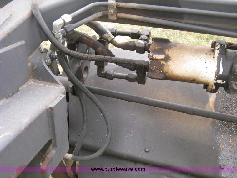 image for item B8041 New Holland self propelled swather crimper attachment