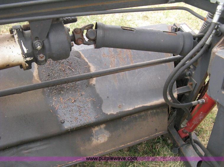 image for item B8041 New Holland self propelled swather crimper attachment