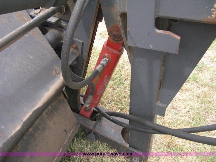 image for item B8041 New Holland self propelled swather crimper attachment