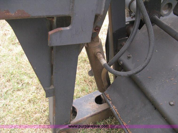 image for item B8041 New Holland self propelled swather crimper attachment