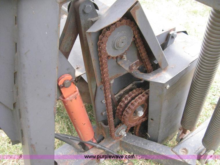 image for item B8041 New Holland self propelled swather crimper attachment