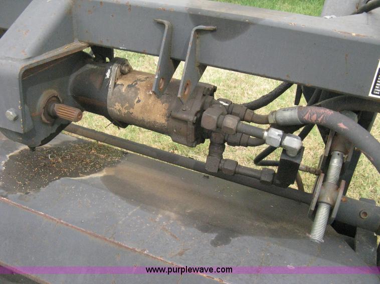 image for item B8041 New Holland self propelled swather crimper attachment