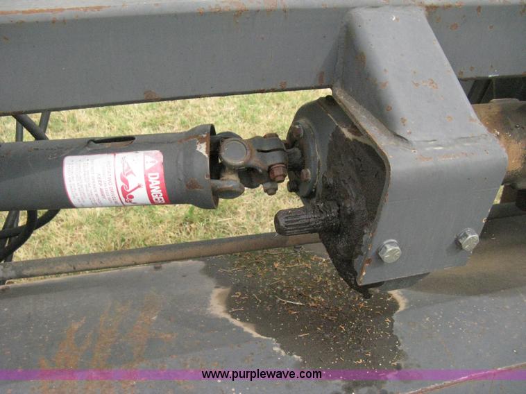 image for item B8041 New Holland self propelled swather crimper attachment