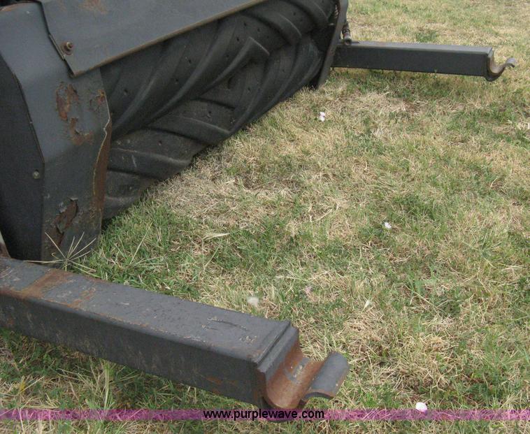 image for item B8041 New Holland self propelled swather crimper attachment